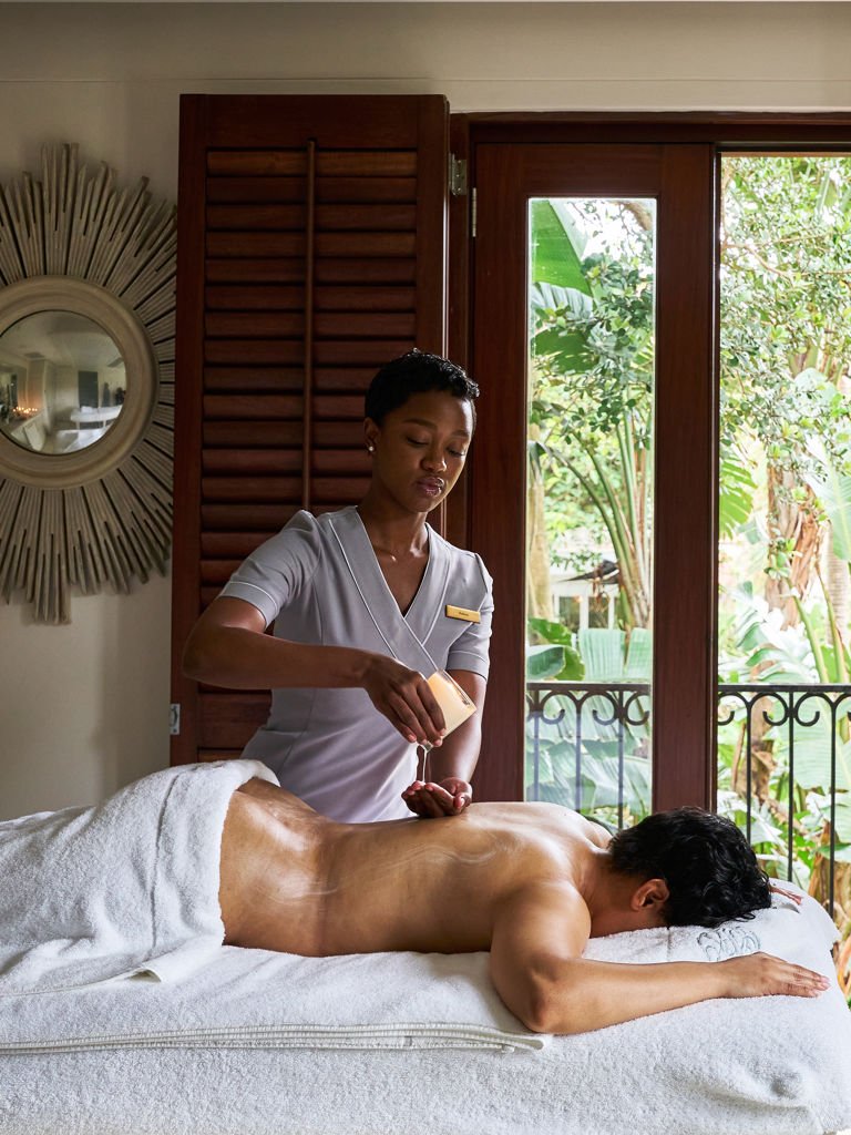 Holistic spa elements like candles and stones